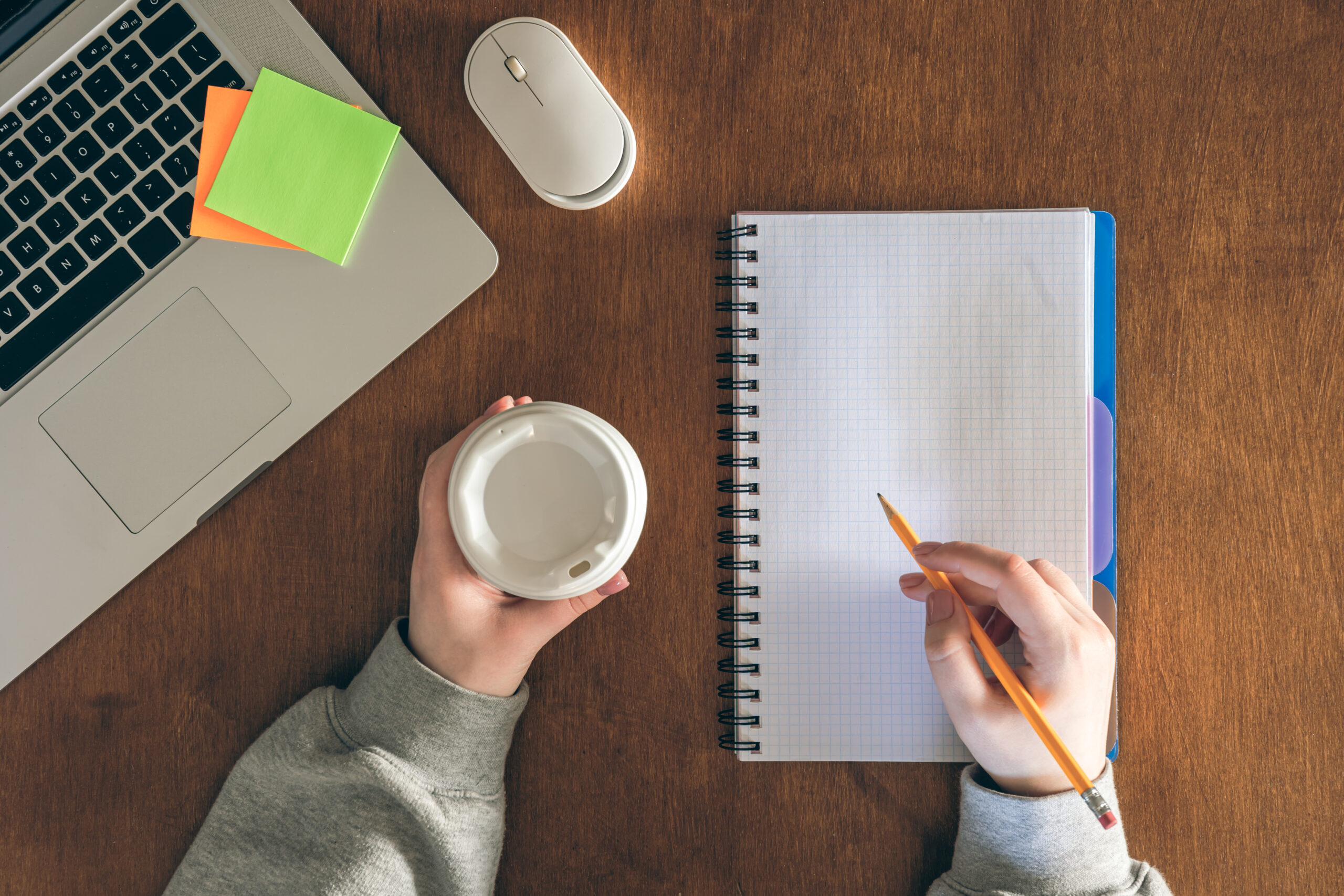Woman With Cup Coffee Writes Notepad Wooden Table Top View - CONTABILIDADE CARIOCA