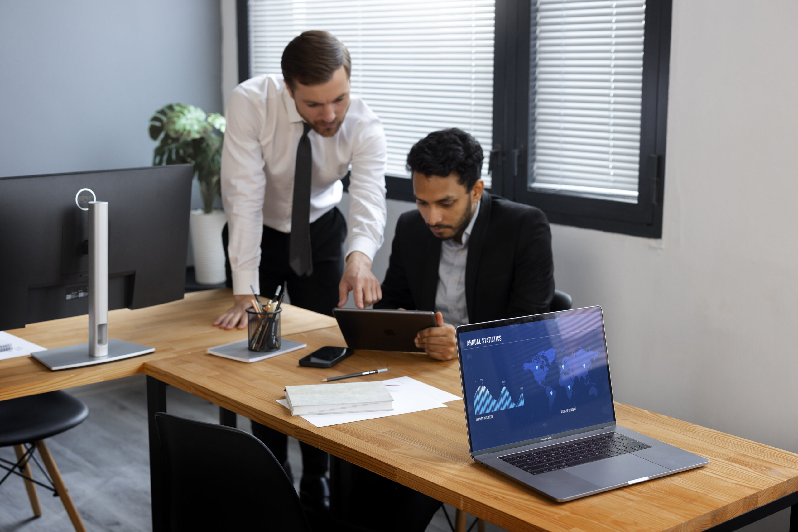 Business Person Looking Finance Graphs - CONTABILIDADE CARIOCA